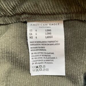 AEO high waisted Green Corduroy flare Pants. Some wear on the heels